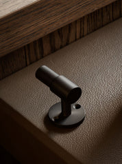SIGNATURE hook for tea towels or bathroom towels made of solid brass with finish in Nearly Black. Designed by Julie Brandt for BRANDT Copenhagen.