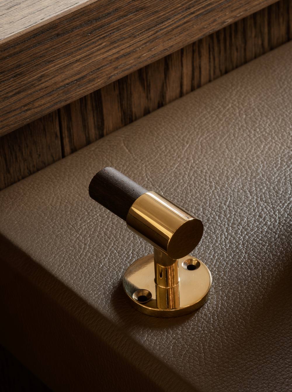 SIGNATURE hook for tea towels or bathroom towels made of solid brass with finish in Polished Brass and Wenge. Designed by Julie Brandt for BRANDT Copenhagen.