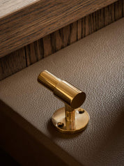 SIGNATURE hook for tea towels or bathroom towels made of solid brass with finish in Polished Brass. Designed by Julie Brandt for BRANDT Copenhagen.