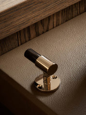 SIGNATURE hook for tea towels or bathroom towels made of solid brass with finish in Polished Nickel and Black Horn. Designed by Julie Brandt for BRANDT Copenhagen.