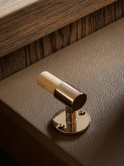 SIGNATURE hook for tea towels or bathroom towels made of solid brass with finish in Polished Nickel and Oak. Designed by Julie Brandt for BRANDT Copenhagen.
