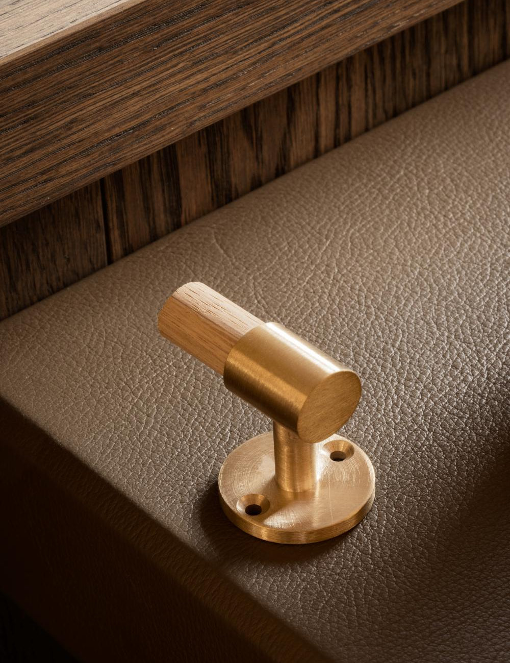 SIGNATURE hook for tea towels or bathroom towels made of solid brass with finish in Satin Brass. Designed by Julie Brandt for BRANDT Copenhagen.