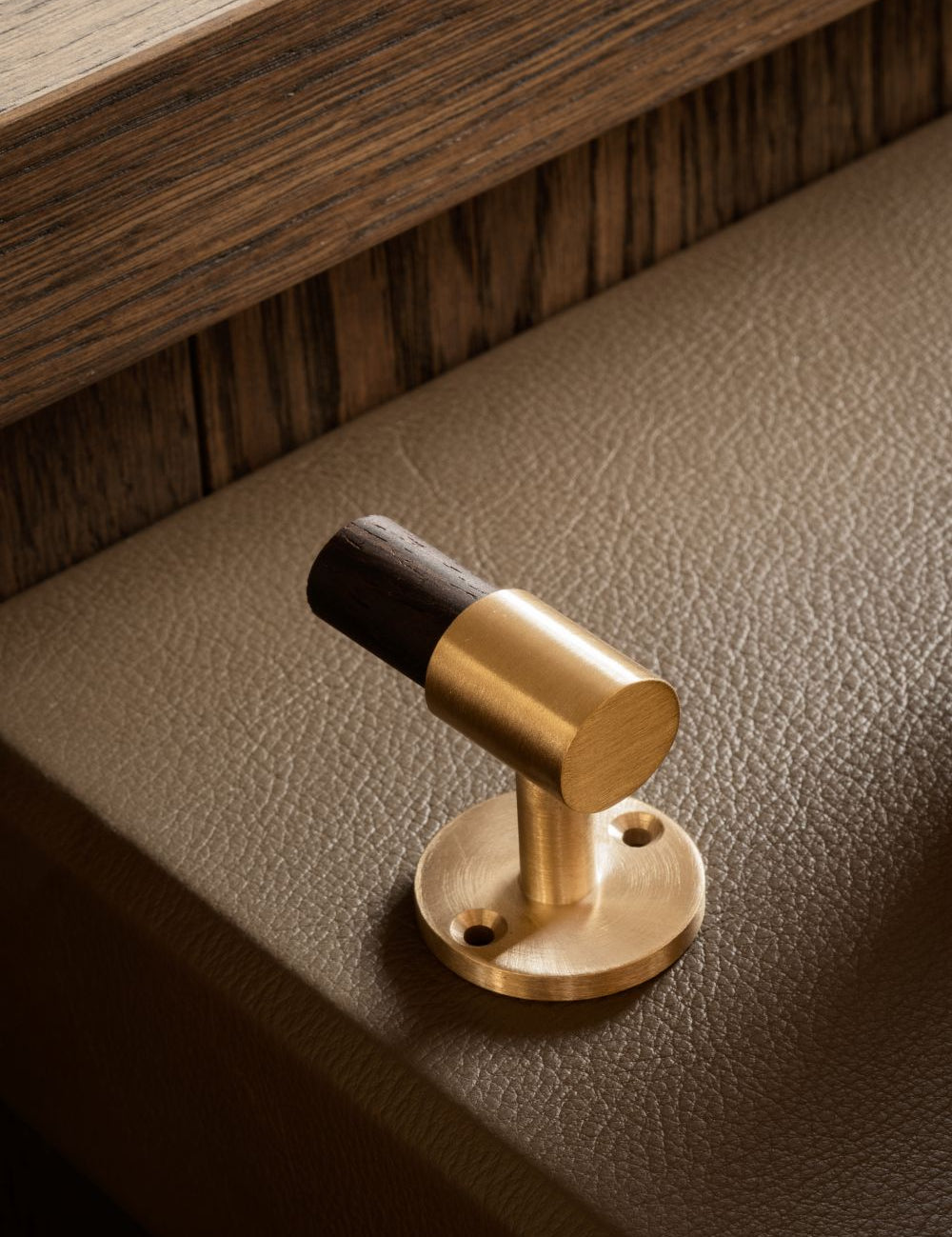 SIGNATURE hook for tea towels or bathroom towels made of solid brass with finish in Satin Brass. Designed by Julie Brandt for BRANDT Copenhagen.