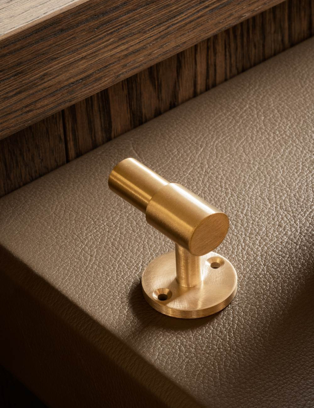 SIGNATURE hook for tea towels or bathroom towels made of solid brass with finish in Satin Brass. Designed by Julie Brandt for BRANDT Copenhagen.