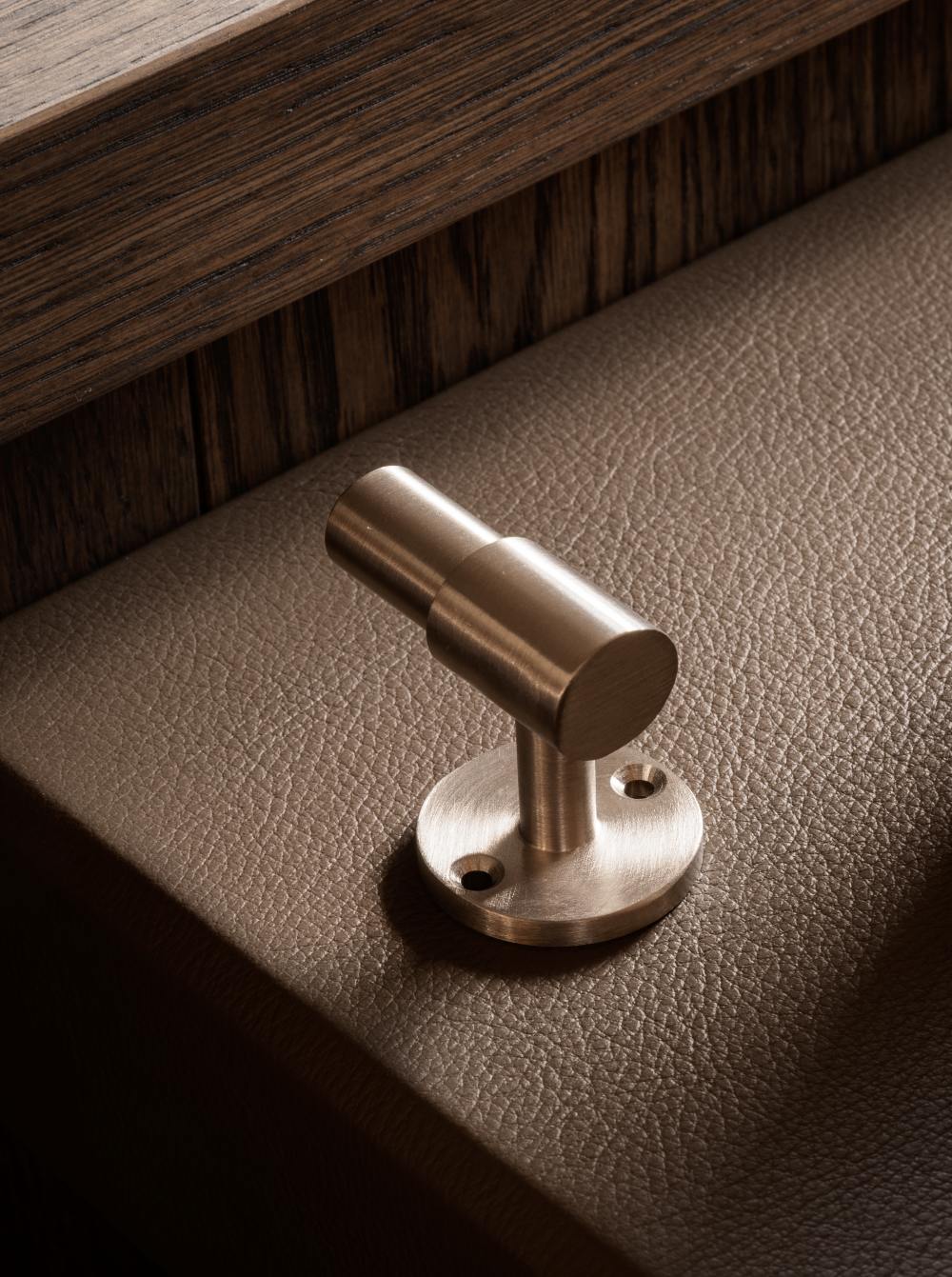 SIGNATURE hook for tea towels or bathroom towels made of solid brass with finish in Satin Nickel. Designed by Julie Brandt for BRANDT Copenhagen.