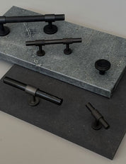 SIGATURE knob in Nearly Black. Elegant cabinet hardware designed by BRANDT Copenhagen.