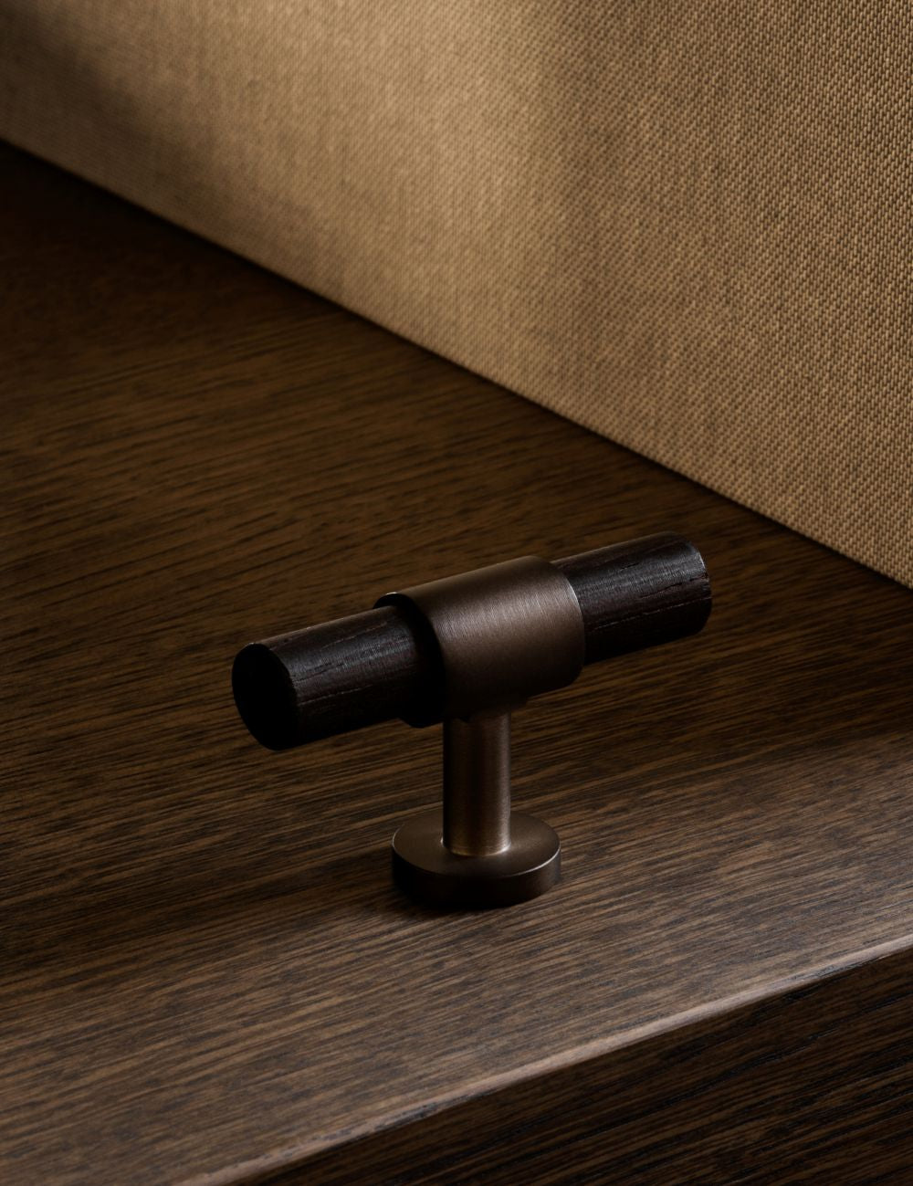 Cabinet handle SIGNATURE 30 T-bar 54 mm in burnished brass and wengé from BRANDT Copenhagen.