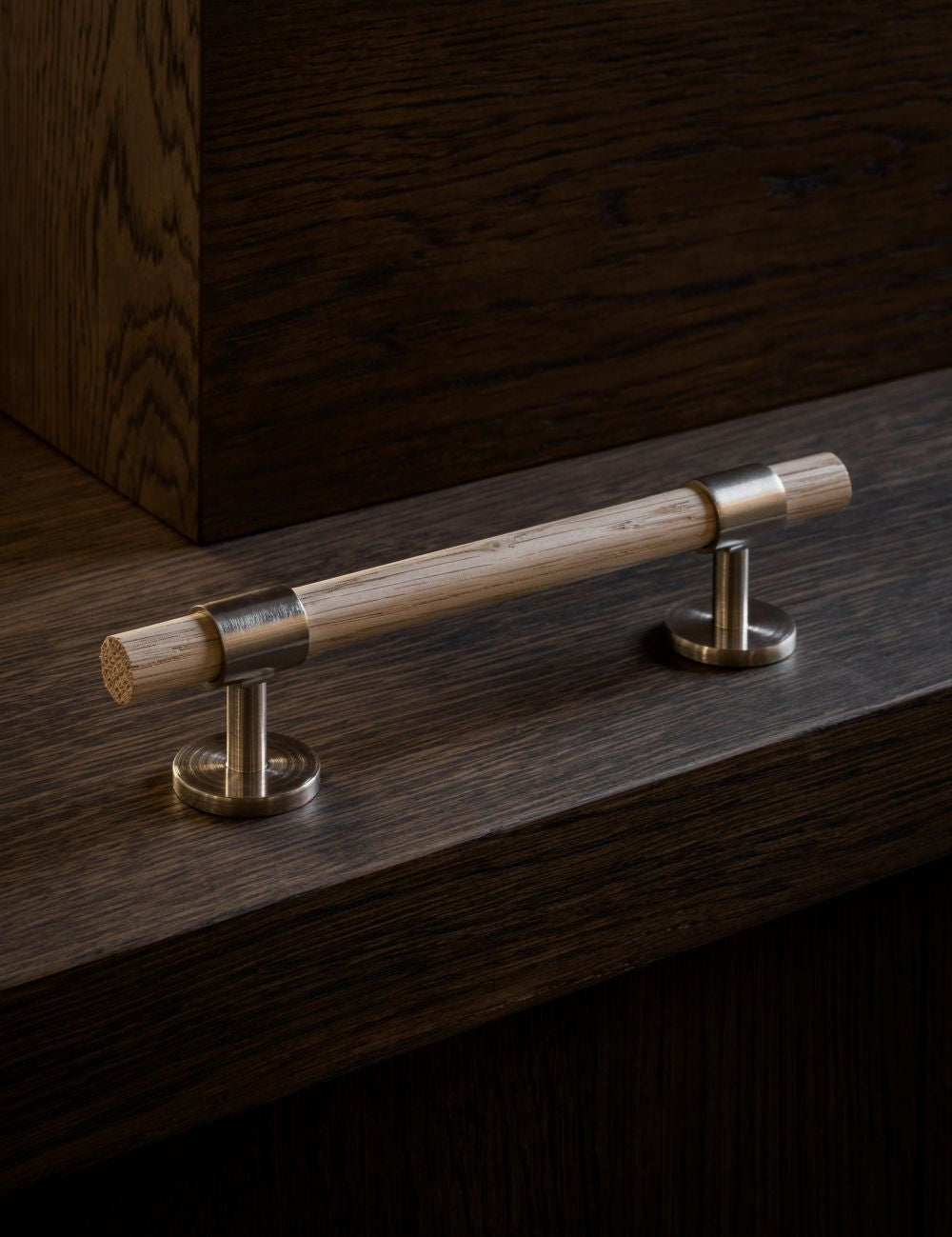 Oak. Luxury cabinet hardware made of solid brass by BRANDT Copenhagen