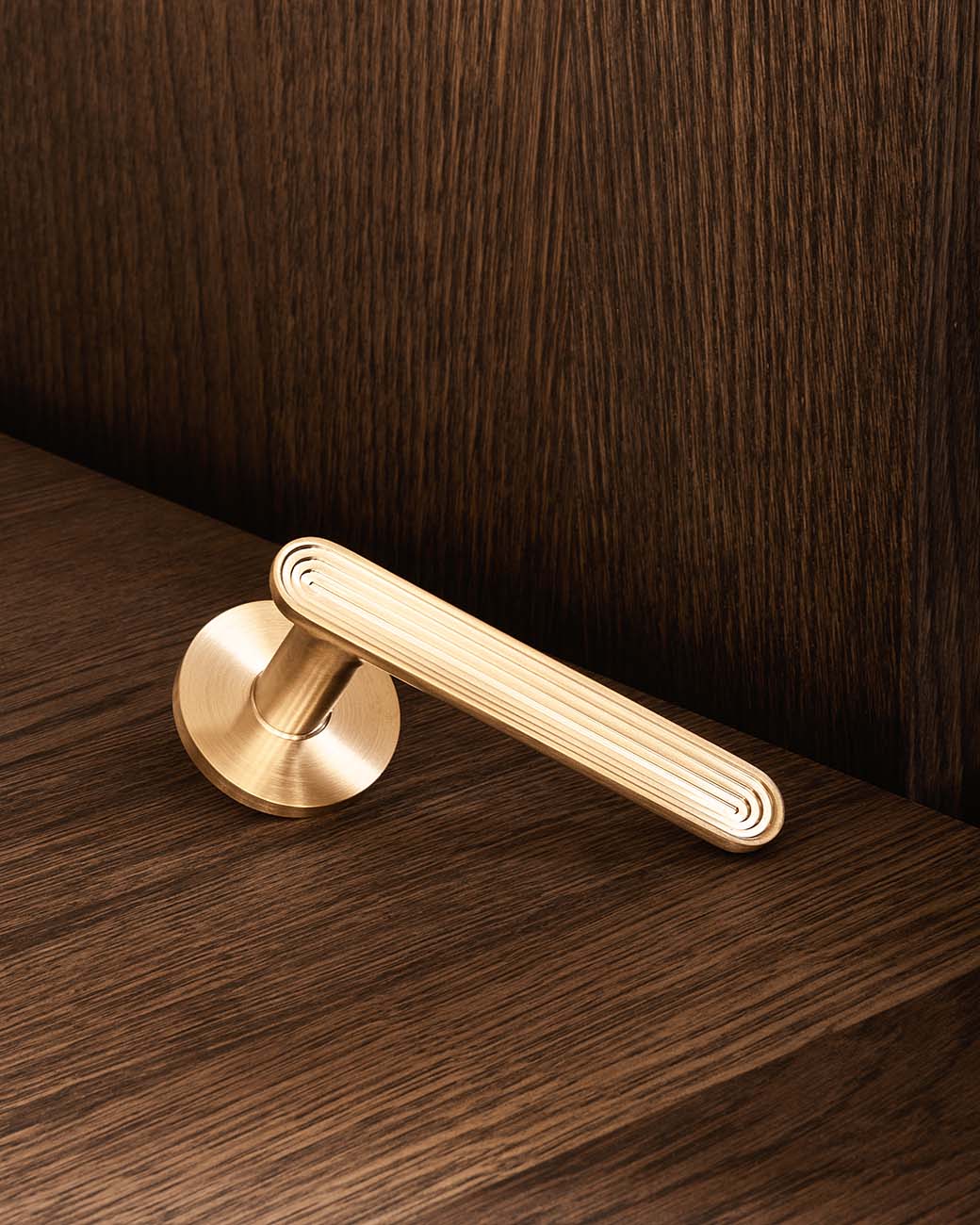 TERRACE door handle set in Satin Brass from BRANDT Copenhagen. Designed in collaboration with Norm Architects.