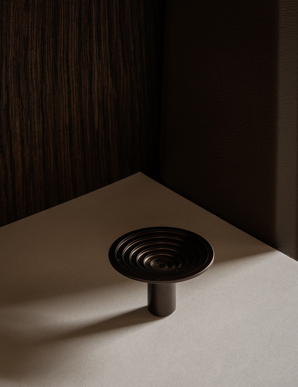 TERRACE knob in burnished brass by BRANDT Copenhagen. A hardware collection in collab with Norm architects consisting of knobs, T-bars and pull bars.