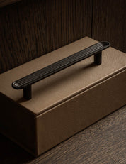 TERRACE collection in Gunmetal by BRANDT Copenhagen. A hardware collection in collab with Norm architects consisting of knobs, T-bars and pull bars.