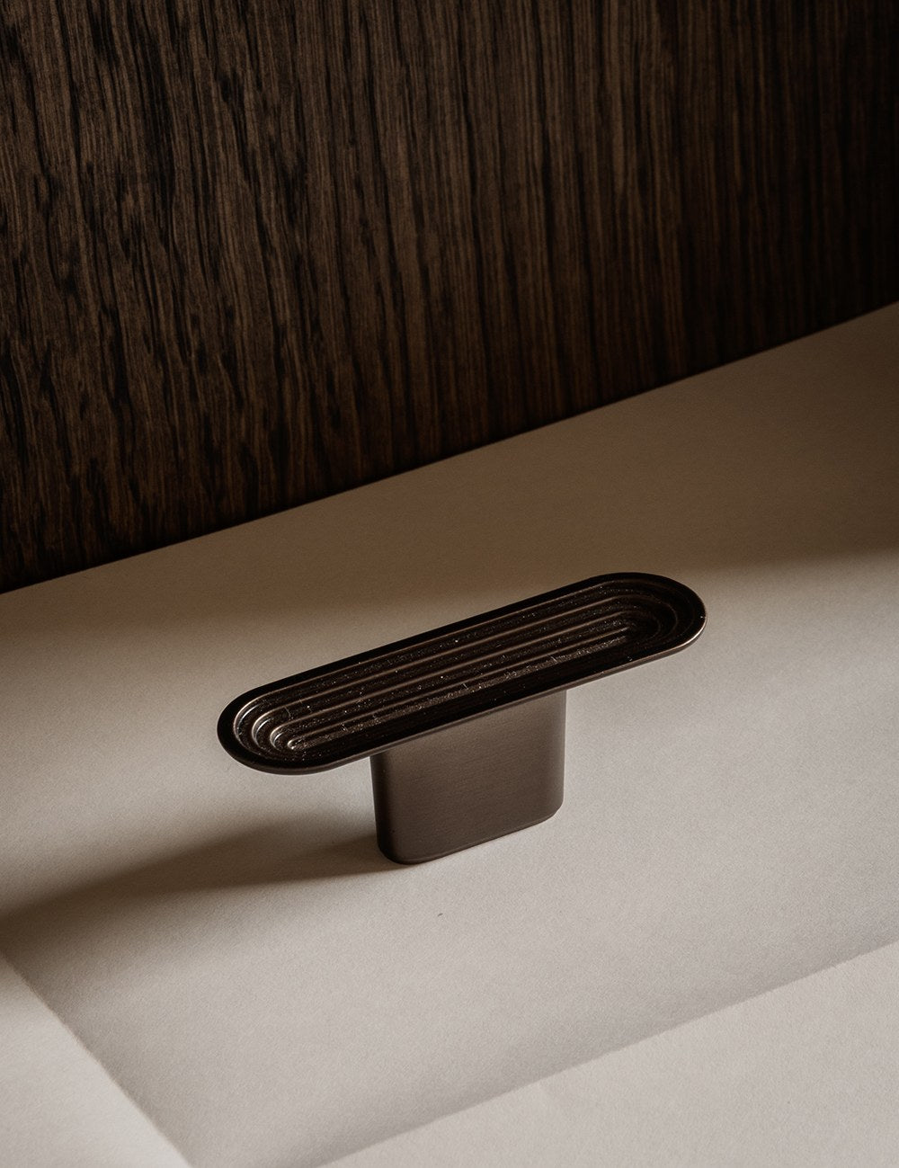 TERRACE T-bar in Burnished Brass by BRANDT Copenhagen. A hardware collection in collab with Norm architects consisting of knobs, T-bars and pull bars.