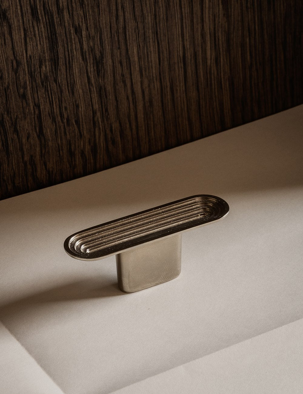 TERRACE T-bar in Satin Nickel by BRANDT Copenhagen. A hardware collection in collab with Norm architects consisting of knobs, T-bars and pull bars.