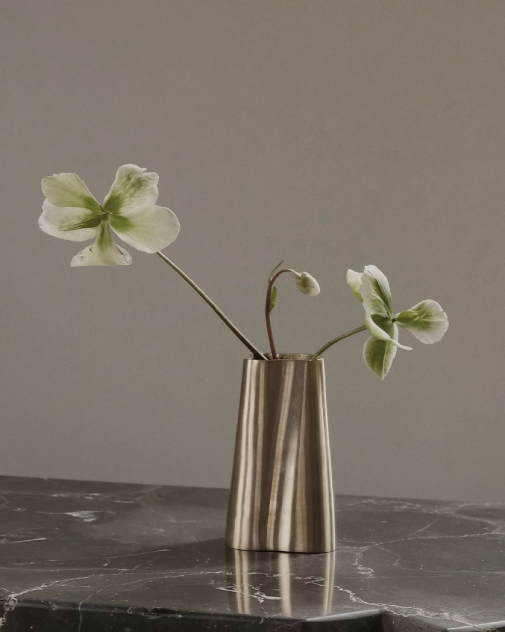TRUNK vase small in satin brass. Designed by Julie Brandt for BRANDT Copenhagen