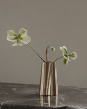 TRUNK vase small in satin brass. Designed by Julie Brandt for BRANDT Copenhagen