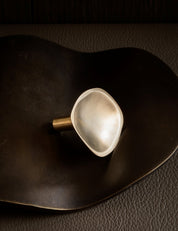 VALE knob in Satin Brass. Vale collection is part og our organícally shaped hardware for cabinets and kitchens. Designed by Julie Brandt for BRANDT Copenhagen.