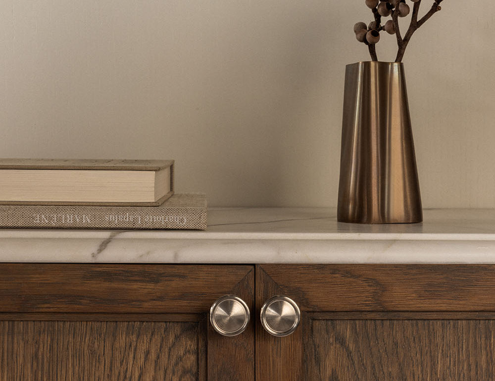 BRANDT Copenhagen TRTUNK vase in burnished brass with satin nickel button knobs